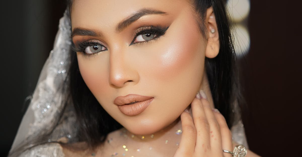 Elegant bridal portrait showcasing stunning makeup and jewelry. Perfect for wedding inspiration.